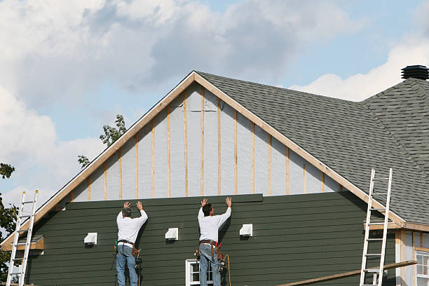Professional Siding technician working in Chevy Chase, MD